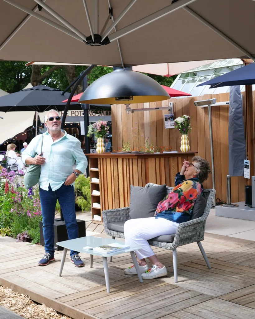 Prue Leith and Paul Hollywood from The Great British Bake off on the Instashade Stand at RHS Chelsea Flower Show
