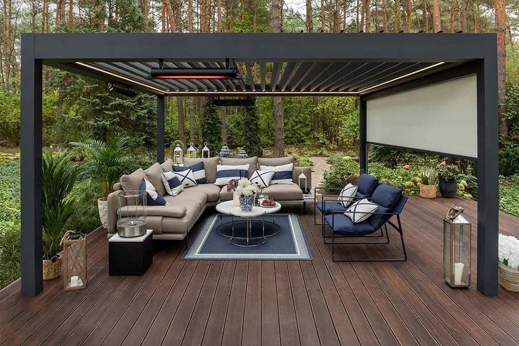 Luxury all-weather outdoor room in a modern UK garden setup with comfortable seating.