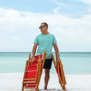 Oakwood-Deck-Chair-Man-Carrying-Folded-Chair Oakwood Premium Deckchair
